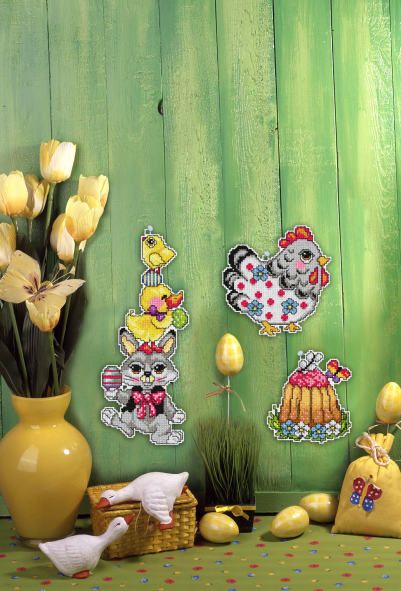 Counted cross stitch kit featuring three Easter designs with plastic canvas and DMC cotton threads.